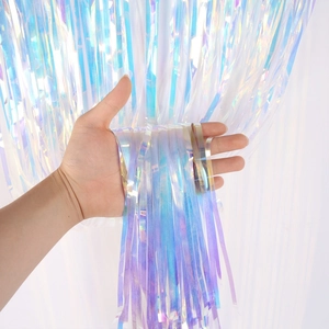 Vibrant iridescent tinsel fringe curtain for party backdrops with metallic foil shine