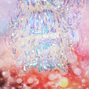 Holographic tinsel curtain backdrop for birthday party decorations with rainbow effect