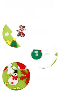 Detail showing DIY felt Christmas tree parts with Velcro attachments and festive ornaments