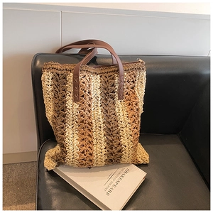 Fashionable woven straw shoulder bag with colorful stripes and brown PU leather handles
