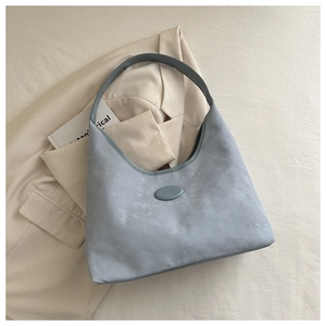 Minimalist haze blue hobo shoulder bag in premium matte faux suede finish