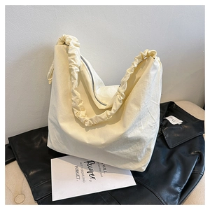 Chic beige nylon crossbody bag with large capacity and scrunchie style shoulder strap