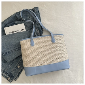 Minimalist woven tote bag in cream white and sky blue leather with dual top handles