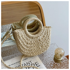 Borsa a mano alla moda in paglia beige con manici tondi e tracolla rimovibile