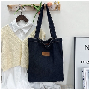 Retro deep blue denim canvas tote bag with leather label and dual shoulder straps