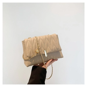Quilted crossbody bag in beige PU leather with gold chain strap and metal buckle