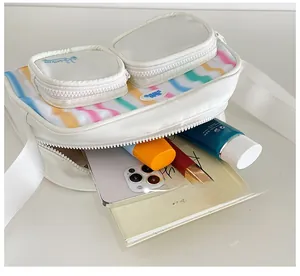 Detailed interior of nylon shoulder bag showing spacious storage for makeup and phone