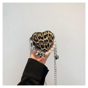 Chic heart-shaped mini crossbody bag with leopard print and pearl heart handle