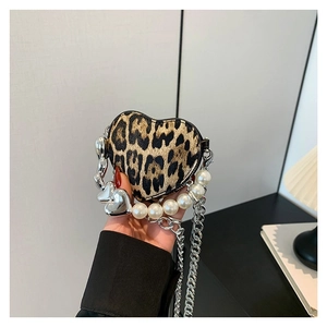 Heart-shaped leopard print mini crossbody bag with pearl chain and heart metal pendants