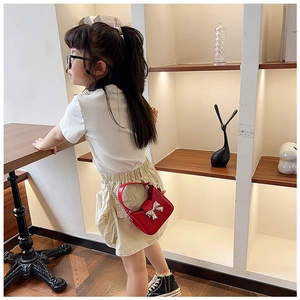 Kid's stylish red PU leather handbag with silver bow detail and metallic chain strap