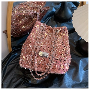 Pink sequin bucket bag for women with a metallic chain strap and shimmering design