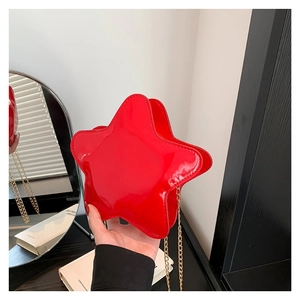 Fashionable red star-shaped PU leather crossbody bag with glossy finish and gold chain strap