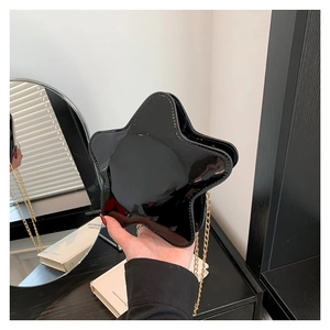 Chic black star-shaped crossbody bag with glossy patent leather finish and gold chain