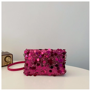 Sparkly rose pink sequin crossbody bag with rectangular flap and thin leather strap