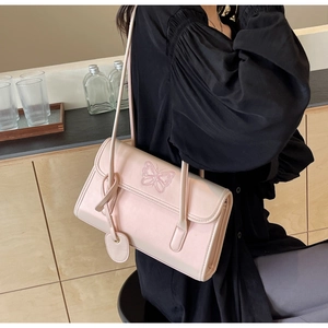 Pink PU leather shoulder bag featuring delicate butterfly embroidery and elegant flap