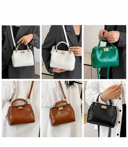 Detail showing vintage oil leather crossbody bags in four colors with gold metal locks