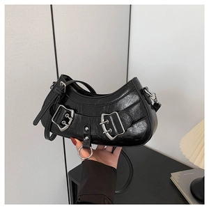 Minimalist black PU leather crescent crossbody bag with silver buckles for spring 2024