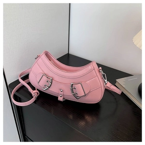 Pink crescent moon PU leather crossbody bag with silver buckles and adjustable strap