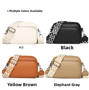 Close-up of four colorful crossbody bags with wide patterned straps and lychee texture