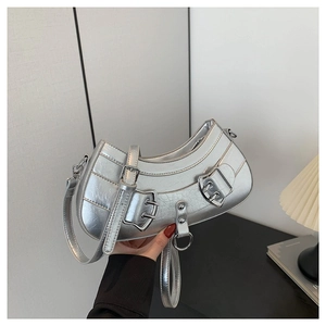 Silver metallic PU leather crescent bag with Y2K buckle straps and adjustable strap