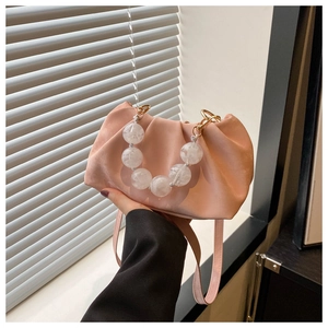 Chic pink pleated cloud pouch bag with transparent acrylic bead handle and crossbody strap