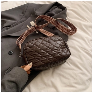 Retro dark brown quilted crossbody camera bag with wide geometric patterned strap