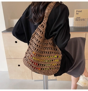 Brown hand-woven straw mesh tote bag showing large capacity for summer shopping use