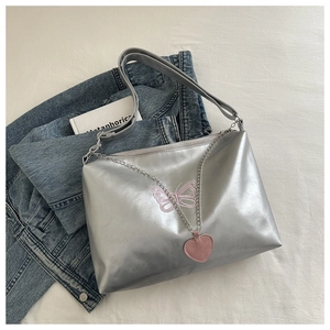 Silver matte PU leather tote bag with pink butterfly embroidery and heart chain pendant