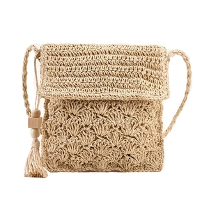 Chic handmade straw crossbody bag with shell pattern crochet and wood bead tassel