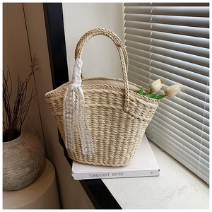 Fashionable straw woven shoulder bag for women with decorative white lace ribbon