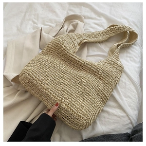 Elegante borsa tote in paglia beige intrecciata a mano per donna, ideale per le vacanze