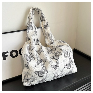 Minimalist white lace tote bag with black butterfly print and frayed edges for women