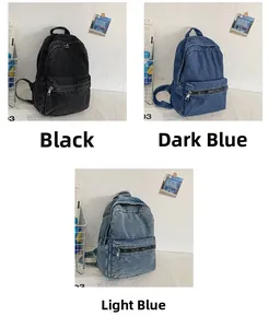 Detailed comparison of washed denim backpacks in black, dark blue, and light blue colors