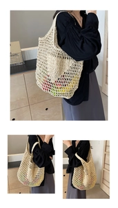 Detail of handmade cream cotton rope hollow woven tote bag with diamond mesh pattern