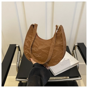 Chic brown wrinkled PU leather hobo bag with a minimalist half-moon design for women