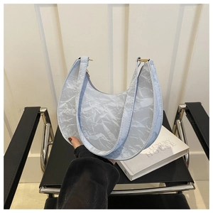 Minimalist light blue hobo shoulder bag with pleated faux leather texture and gold buckle