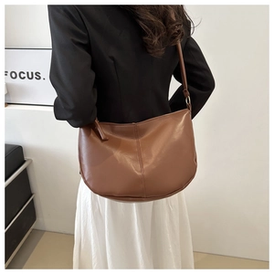 Detailed view of the brown PU leather Hobo crossbody bag with adjustable strap for women