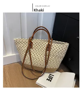 Detail of khaki woven tote bag with leather handles and interior space display
