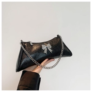 Minimalist black triangle PU leather crossbody bag with silver bow and metal chain strap