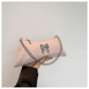 Pink PU leather crossbody bag with silver bow and chain strap for women