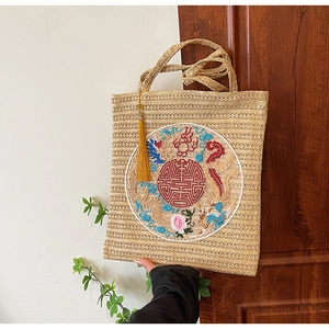 Chic beige woven straw handbag for women featuring a traditional Chinese dragon embroidery