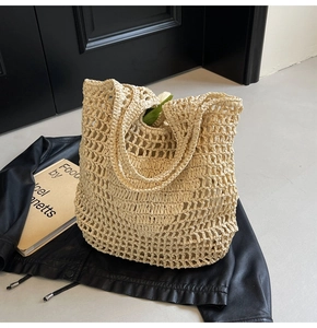 Close-up of woven cotton rope tote bag with minimalist hollow mesh pattern detail