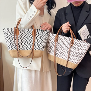 Bohemian handmade woven tote bag with contrast colors and long leather handles for women