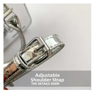 Detail of adjustable silver PU leather shoulder strap with metallic buckle and stitching