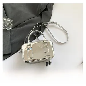 Silver metallic mini crossbody bag with Fashion & Bags logo on a white background