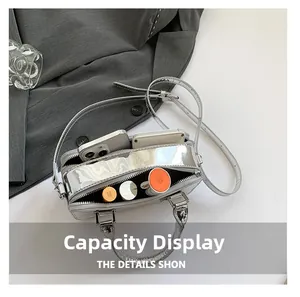 Top view of silver mirror PU leather bag showing spacious interior for essentials