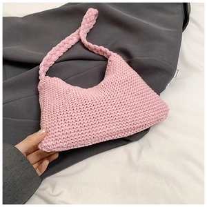 Pink knit hobo shoulder bag with a crescent shape and chunky woven texture for women