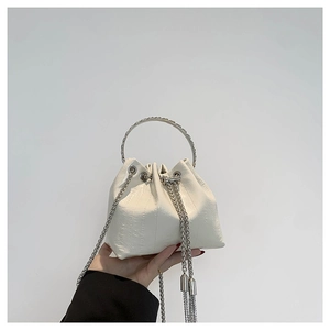 Chic white PU bucket bag with silver ring handle and long metallic chain fringes