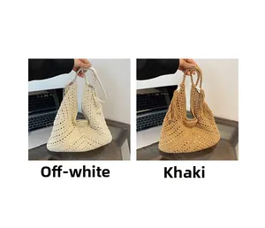 Detail of hand-crocheted tote bags with fringe in beige and khaki colors