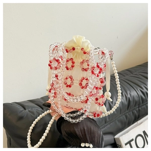 Handmade beaded handbag with red floral patterns and pearl strap for stylish women